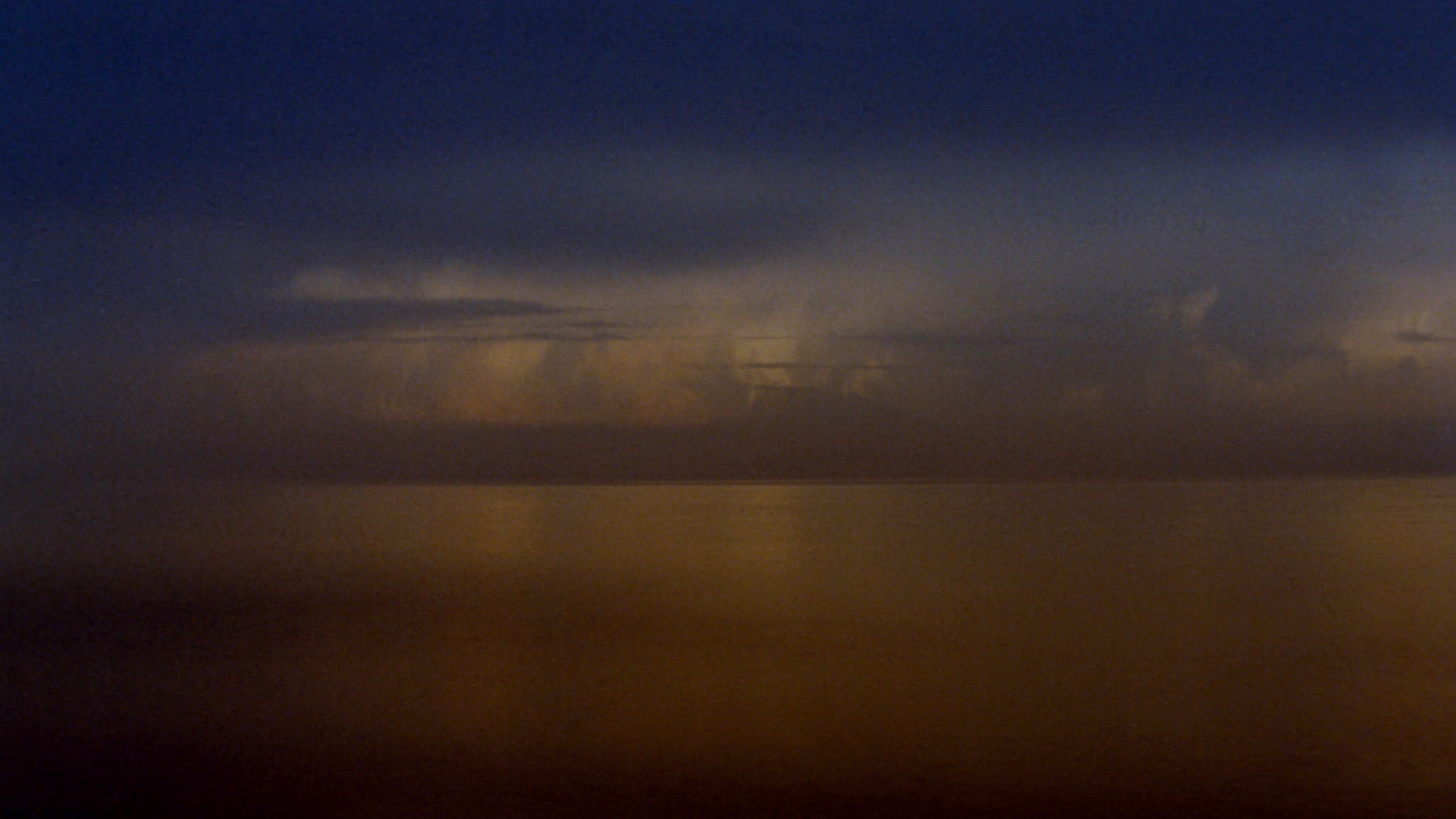 Calm ocean horizon at twilight